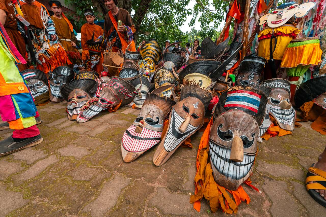 Phi Ta Khon masked dancers  in Thailand